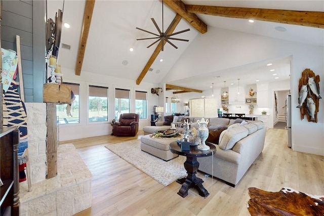 1981 County Road 202, Caldwell, TX 77836 - living area featuring high vaulted ceiling, beamed ceiling, light wood finished floors, and recessed lighting