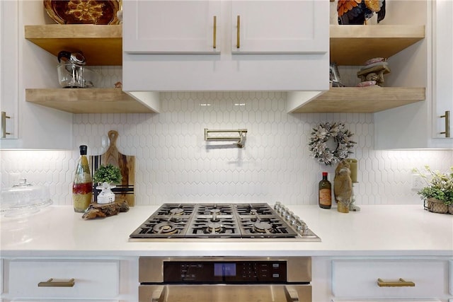 1981 County Road 202, Caldwell, TX 77836 - kitchen with open shelves, oven, stainless steel gas stovetop, and tasteful backsplash