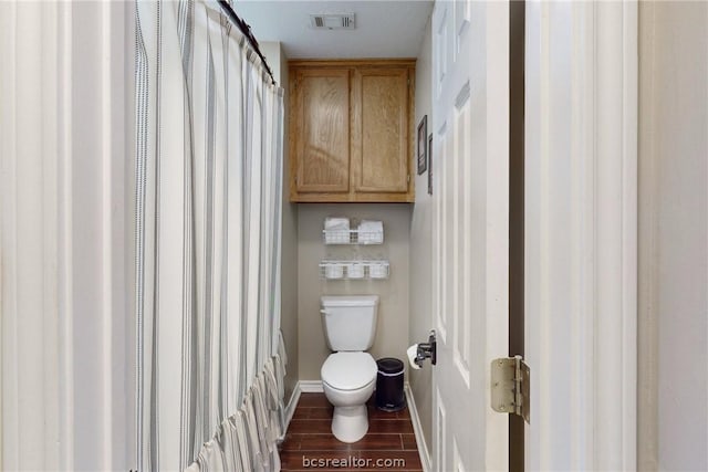 bathroom featuring toilet