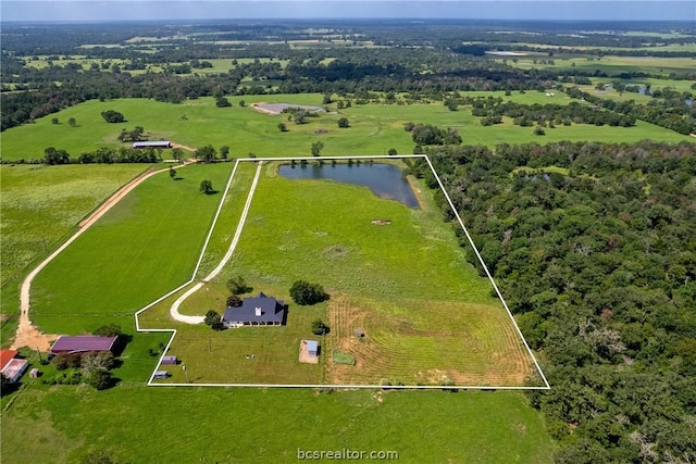 bird's eye view featuring a rural view and a water view