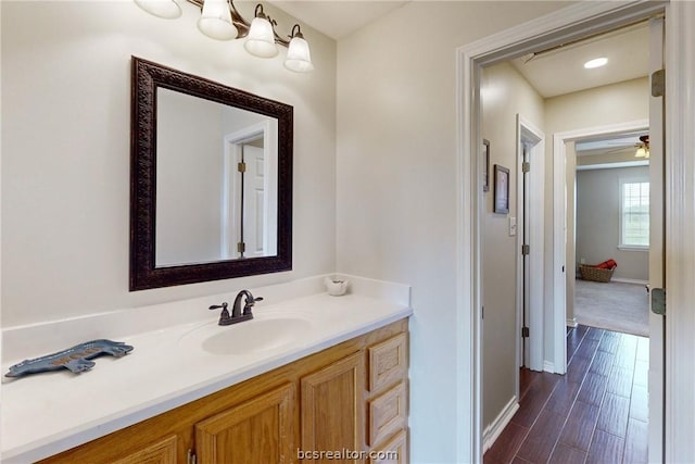 bathroom with vanity and ceiling fan