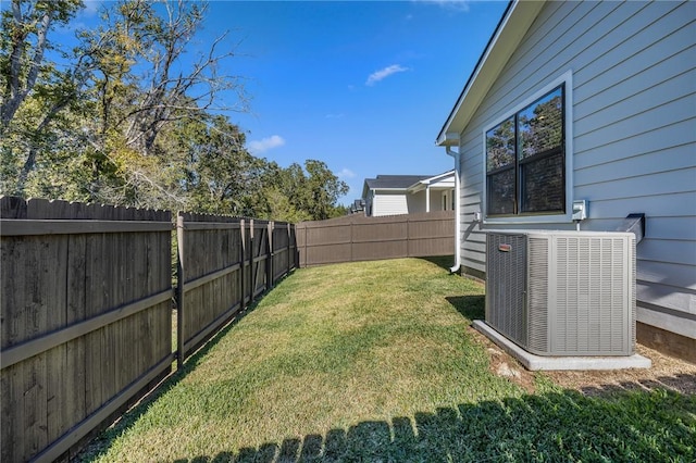 view of yard featuring central AC