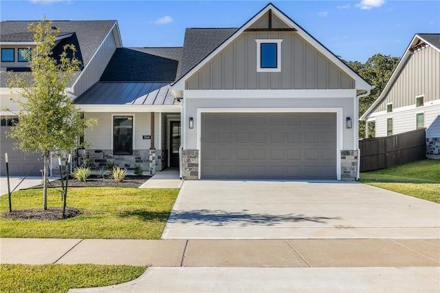 craftsman-style house with covered porch and a front yard