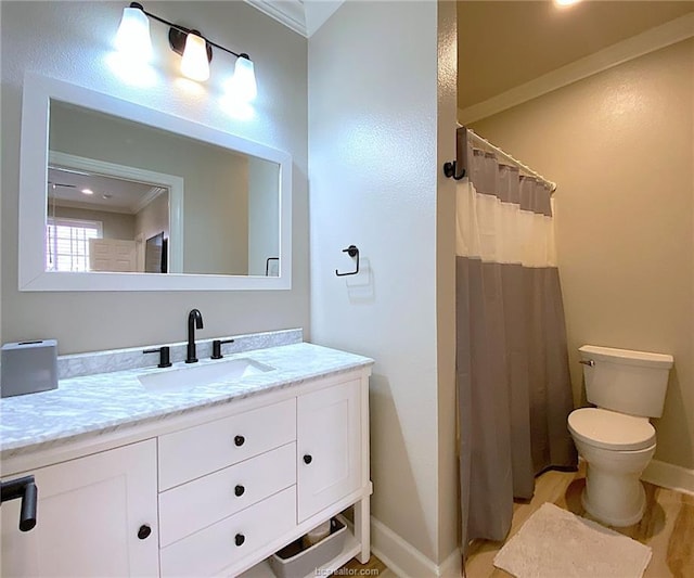 801 Luther St W Unit 1407, College Station, TX 77840 - full bathroom featuring ornamental molding, baseboards, toilet, vanity, and a shower with shower curtain