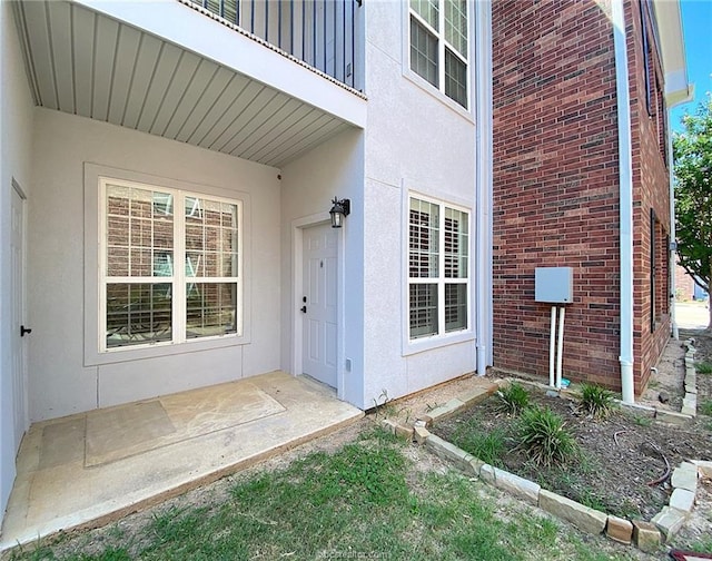 801 Luther St W Unit 1407, College Station, TX 77840 - property entrance with brick siding and stucco siding