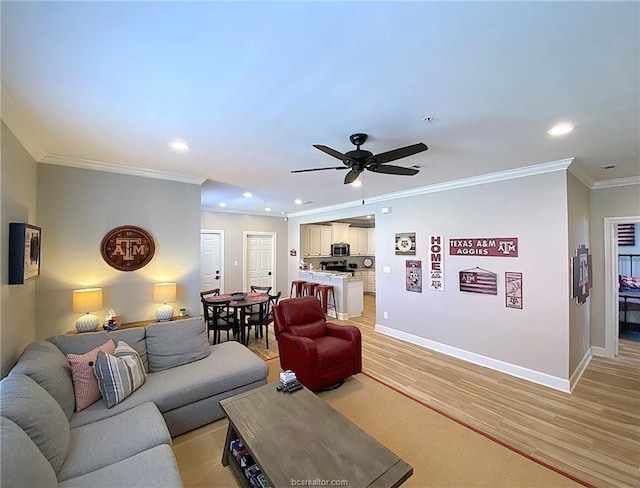 801 Luther St W Unit 1407, College Station, TX 77840 - living room with ornamental molding, baseboards, a ceiling fan, recessed lighting, and light wood-style flooring