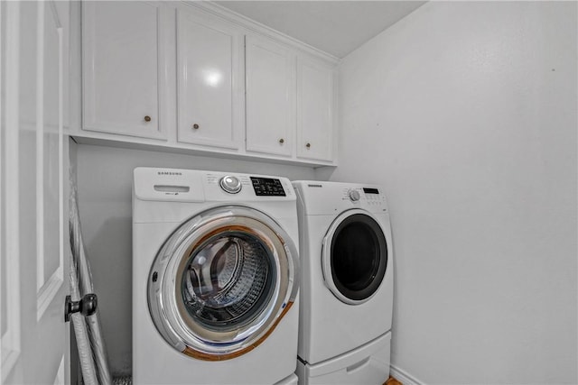 2308 Kuykendall Cir, Bryan, TX 77808 - washroom with washer and dryer and cabinet space