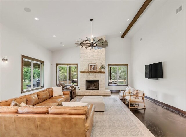 living room featuring a fireplace, recessed lighting, visible vents, and plenty of natural light