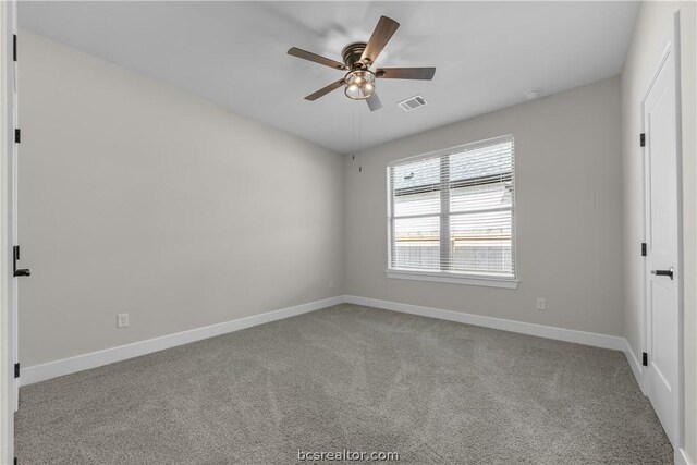 empty room with light carpet and ceiling fan