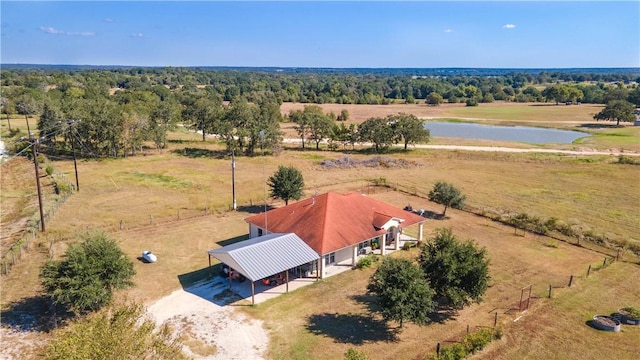 drone / aerial view featuring a rural view and a water view