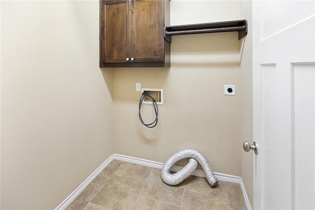 laundry area featuring washer hookup, electric dryer hookup, and cabinets