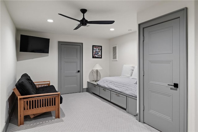 carpeted bedroom with ceiling fan