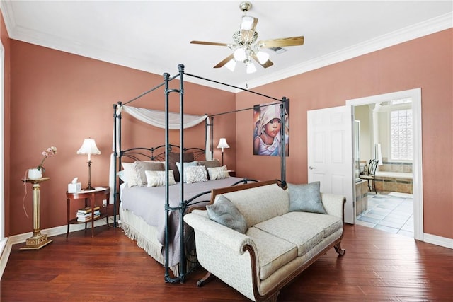 4304 Newcastle Ct, Bryan, TX 77802 - bedroom featuring hardwood / wood-style floors, baseboards, ensuite bathroom, visible vents, and ornamental molding