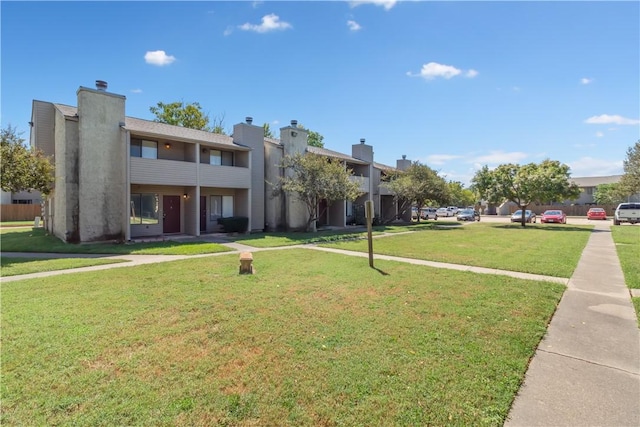 exterior space with a front yard