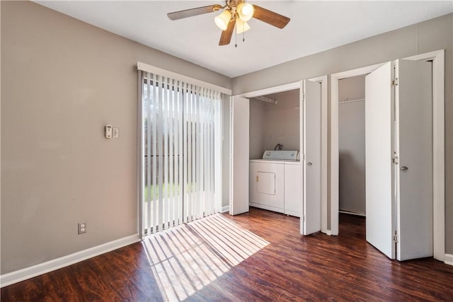 unfurnished bedroom with ceiling fan, dark hardwood / wood-style flooring, washing machine and dryer, and multiple windows