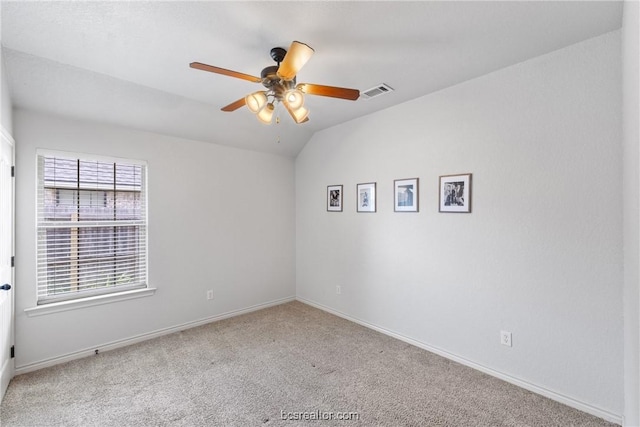 unfurnished room featuring carpet floors, ceiling fan, and lofted ceiling