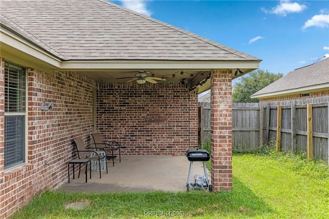 view of patio / terrace featuring ceiling fan and a grill