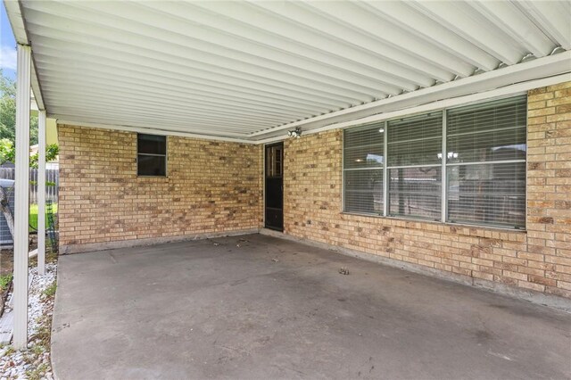 view of patio / terrace with a carport