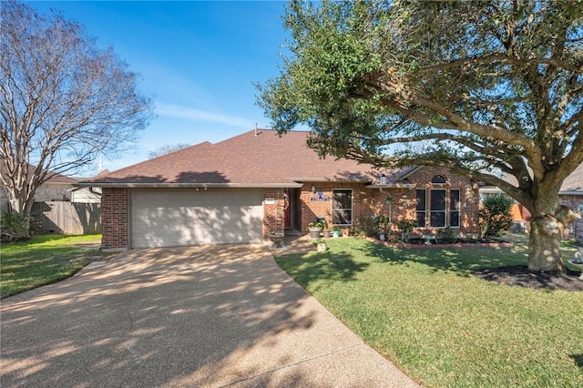 single story home featuring a garage and a front lawn