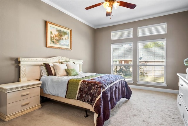 bedroom with ceiling fan, light colored carpet, and ornamental molding