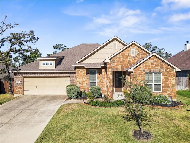 view of front of property featuring a garage and a front lawn