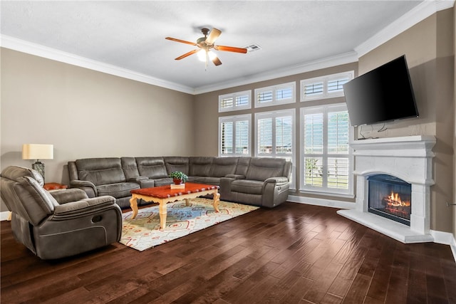 living room featuring ceiling fan, dark hardwood / wood-style flooring, and ornamental molding