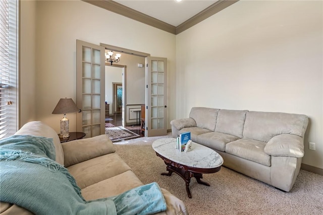 carpeted living area featuring french doors, baseboards, crown molding, and an inviting chandelier