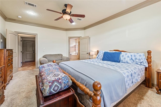 bedroom with carpet, visible vents, and ornamental molding