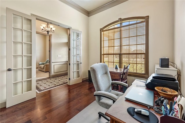 home office with crown molding, a notable chandelier, wood finished floors, and french doors