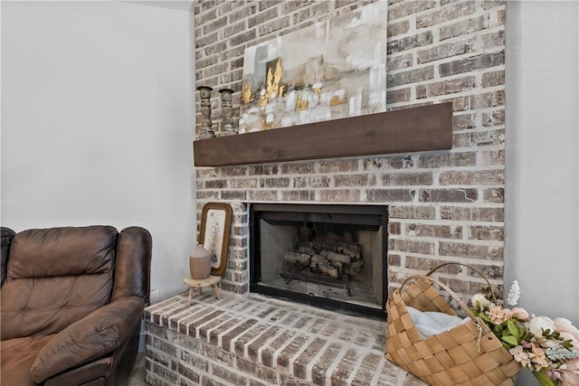 room details featuring a brick fireplace