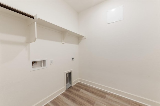 laundry area featuring hardwood / wood-style flooring, hookup for an electric dryer, and washer hookup