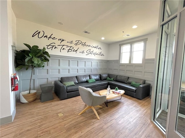 living room with wood-type flooring