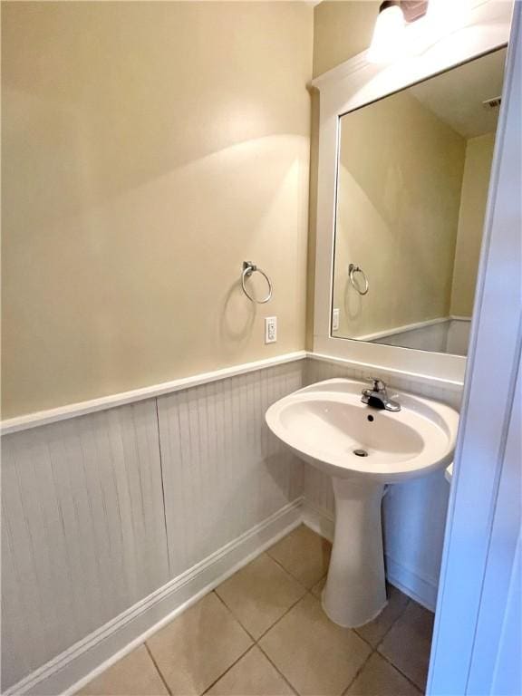 bathroom featuring tile patterned flooring