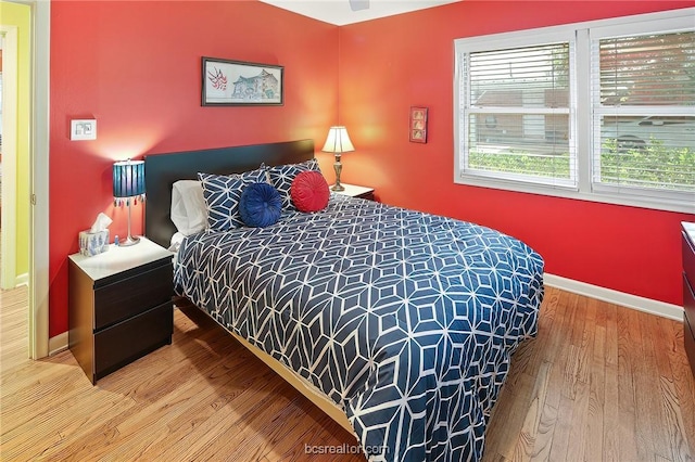 bedroom featuring hardwood / wood-style floors