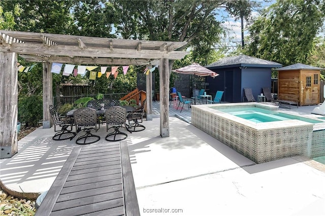 exterior space featuring a storage shed, a pergola, and an in ground hot tub