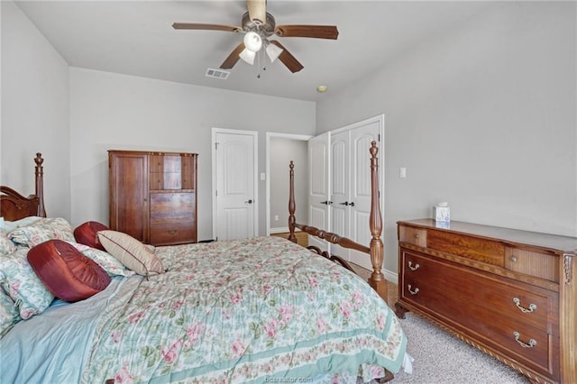 bedroom with ceiling fan and light colored carpet