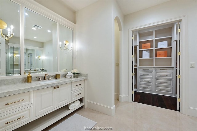 bathroom featuring hardwood / wood-style floors and vanity