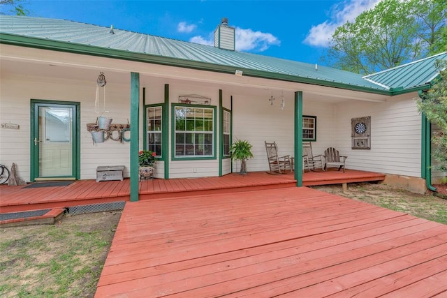 wooden terrace featuring a porch