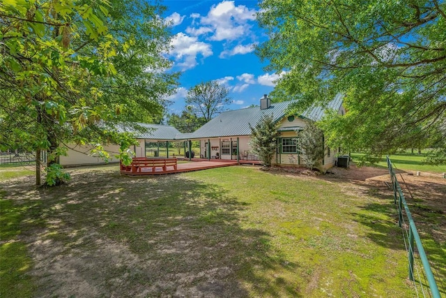 view of yard with a deck