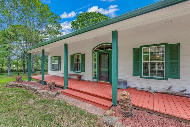 wooden terrace with covered porch