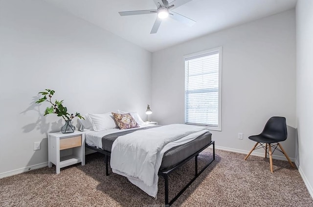 bedroom featuring carpet, vaulted ceiling, and ceiling fan