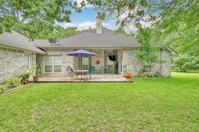 5303 Creek Ln, College Station, TX 77845 - back of house with brick siding and a deck