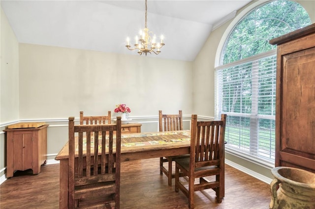 5303 Creek Ln, College Station, TX 77845 - dining space with dark wood-style floors, a chandelier, vaulted ceiling, and baseboards