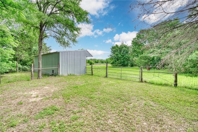 5303 Creek Ln, College Station, TX 77845 - view of yard with an outbuilding, an outdoor structure, and a gate