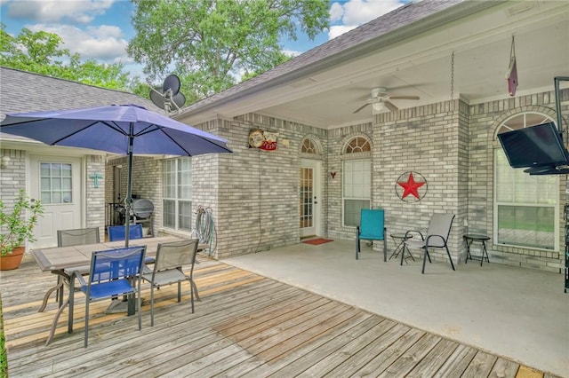 5303 Creek Ln, College Station, TX 77845 - wooden deck with ceiling fan and outdoor dining space