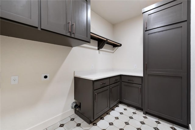 laundry room featuring cabinets and hookup for an electric dryer