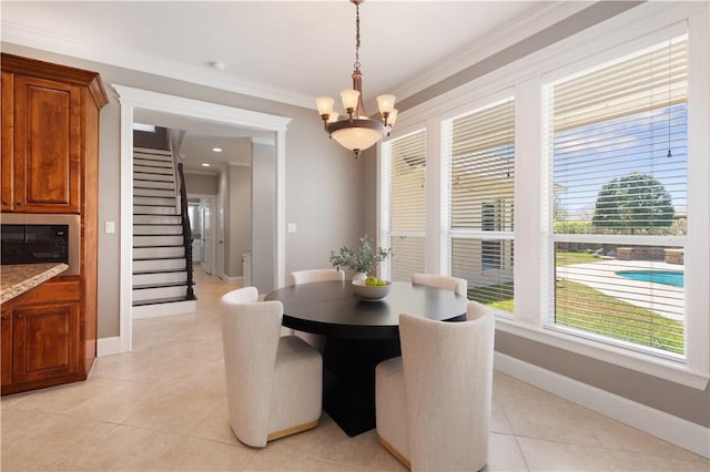5106 Bellerive Bend Dr, College Station, TX 77845 - dining space with stairs, light tile patterned floors, ornamental molding, baseboards, and a notable chandelier