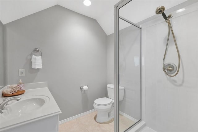 5106 Bellerive Bend Dr, College Station, TX 77845 - bathroom with baseboards, toilet, a stall shower, vaulted ceiling, and tile patterned flooring