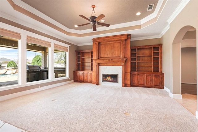 5106 Bellerive Bend Dr, College Station, TX 77845 - unfurnished living room featuring visible vents, light carpet, and a raised ceiling
