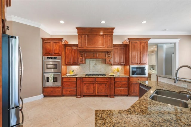 5106 Bellerive Bend Dr, College Station, TX 77845 - kitchen featuring a sink, tasteful backsplash, appliances with stainless steel finishes, and crown molding